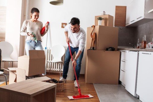 couple cleaning the home